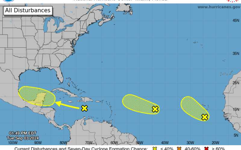 Strong tropical wave grows, shifts west