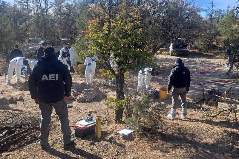 At least 56 bodies found in Mexico in unmarked graves near U.S. border