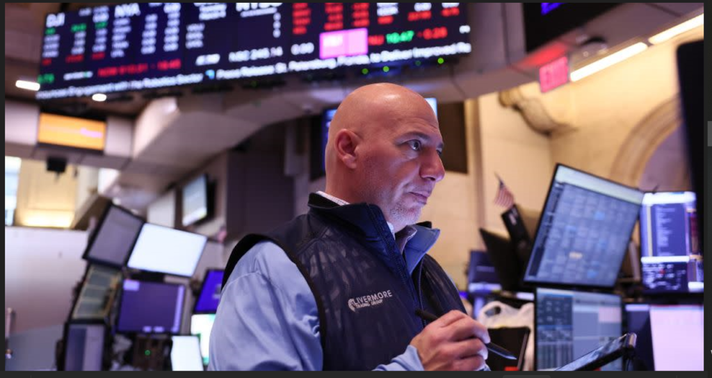 Dow falls by almost 700 points after Trump’s tariffs threaten a dangerous trade war