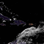 St. Croix: Breezy, clouds and sun, afternoon showers, high 88