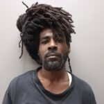 SOB traffic stop nets fugitive from justice with gun, drugs, ammunition