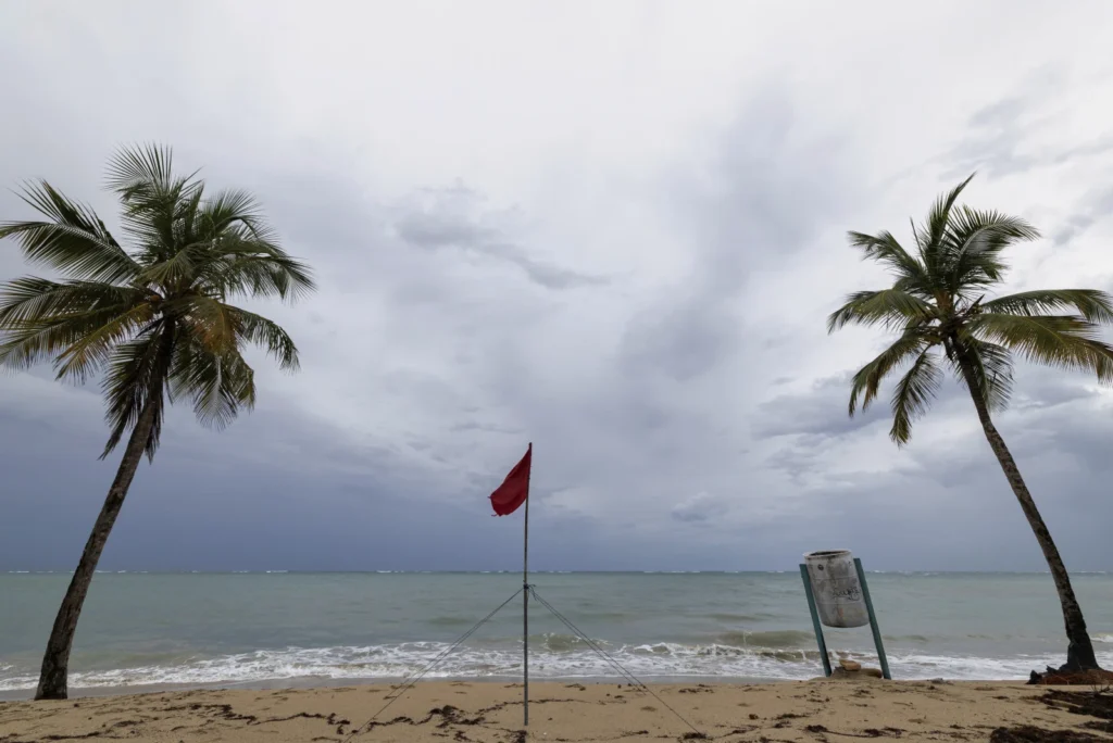 Hurricane Erin weakens to Category 3 as forecasters warn of storm’s rapid growth