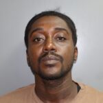 Sleeping woman wakes up to burglar on her bed