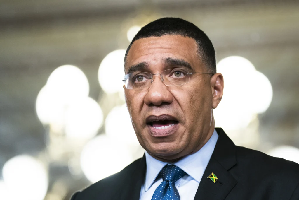 Jamaican Prime Minister Andrew Holness elected to a third term as main opposition candidate concedes