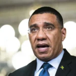 Jamaican Prime Minister Andrew Holness elected to a third term as main opposition candidate concedes