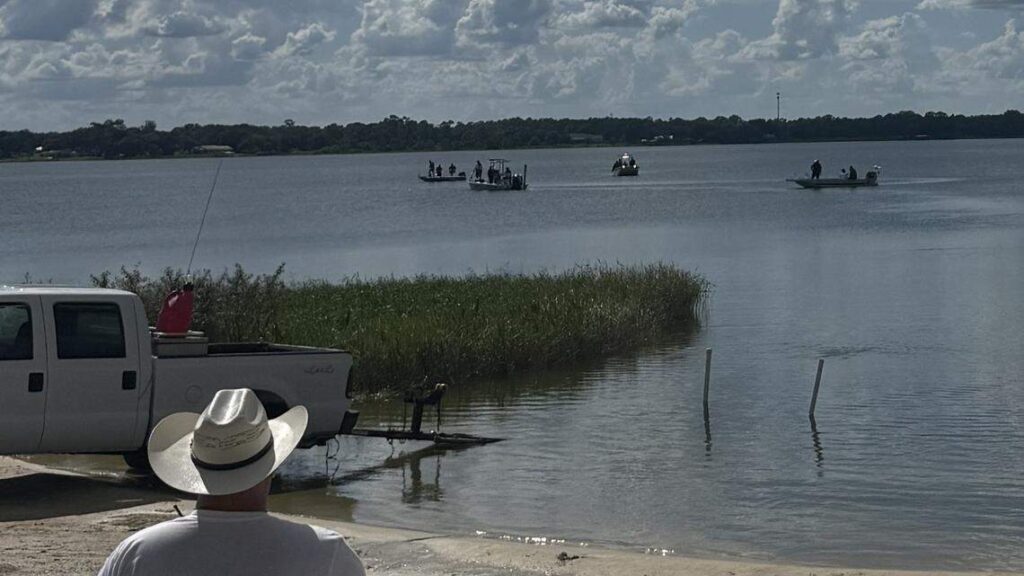 Man drowns swimming after drifting boat on day out with family