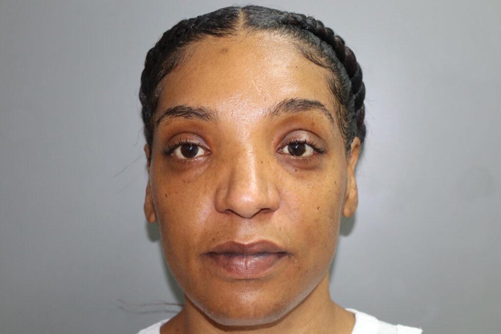 Woman who tidied up crime scene at Nirvana Bar charged