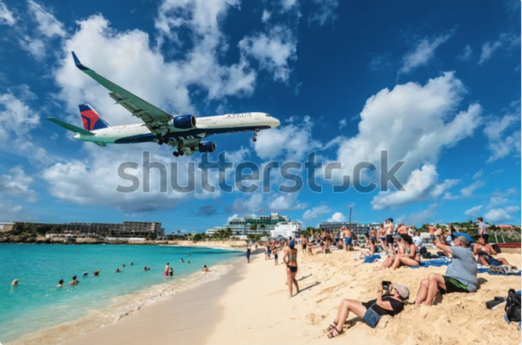 The eerie Caribbean beach where planes fly right above your head – but tourists still call it a tropical paradise