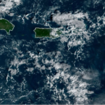 After a cloudy start, the sun returns, breezy this morning with a passing shower or two