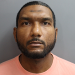 Former VIPD officer arrested after surveillance footage captured him firing shots at neighbor