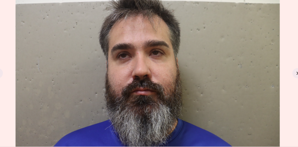 Vocational ed teacher arrested, charged with assaulting woman holding infant child